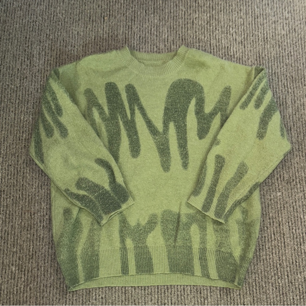 green sweater